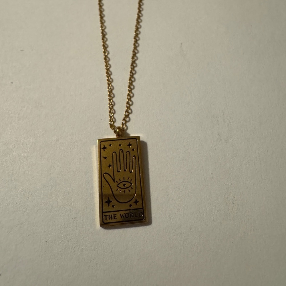 Gold Pendant Necklace with Hand and Eye Design